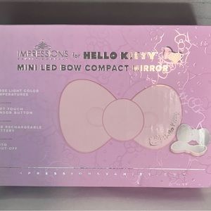 Impressions Hello Kitty mini bow LED mirror.